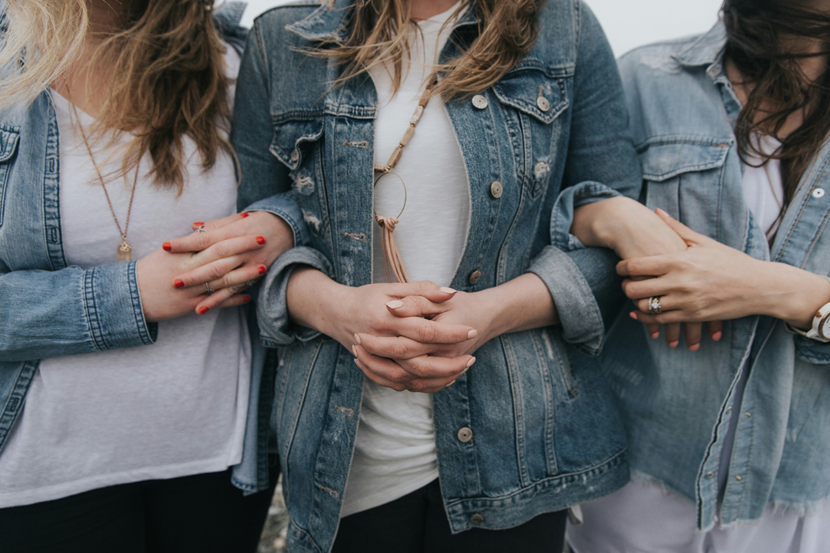 Women linking arms